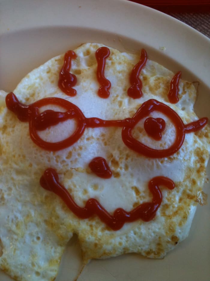 A fried egg. In the United States, we call it 'sunny side up'. In Germany we call it a 'mirror egg'. Can you see your reflection?!
