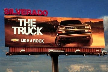 Similes are a commonly used technique in advertising. One example is the slogan for the Chevy Silverado, which emphasizes the truck's toughness by claiming it's "Like a Rock." Another is the catchphrase "Like a good neighbor, State Farm is there."