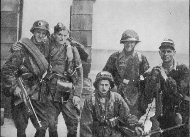 World War Two: Warsaw Uprising. Soldiers from Kolegium "A" of Kedyw on Stawki Street in Wola district. August 11, 1944.
