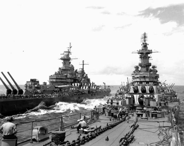 World War 2: USS Missouri (BB-63) (at left) transferring personnel to USS Iowa (BB-61), while operating off Japan on 20 August 1945.