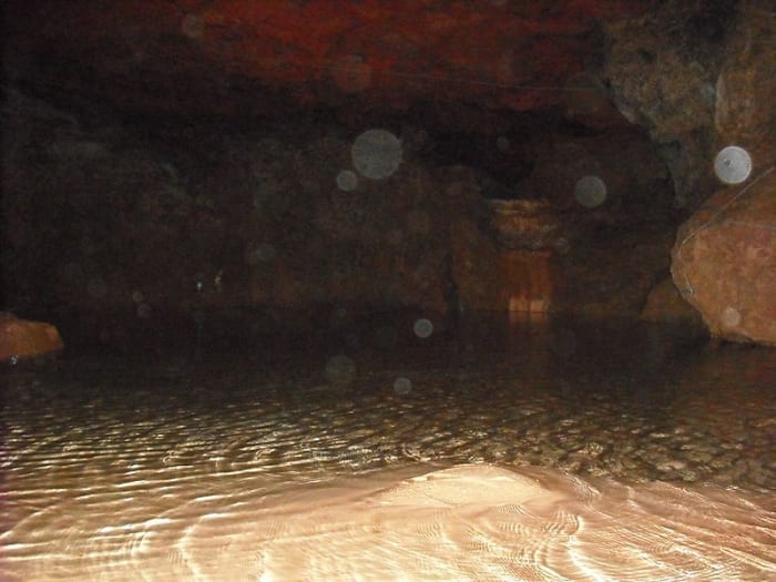 Orbs in Clearwell Caves. These caves are known for this type of phenomena, in addition to the phantom sounds of metal hitting metal further within them. These orbs may represent spirits of miners who had perished while digging for iron ore.