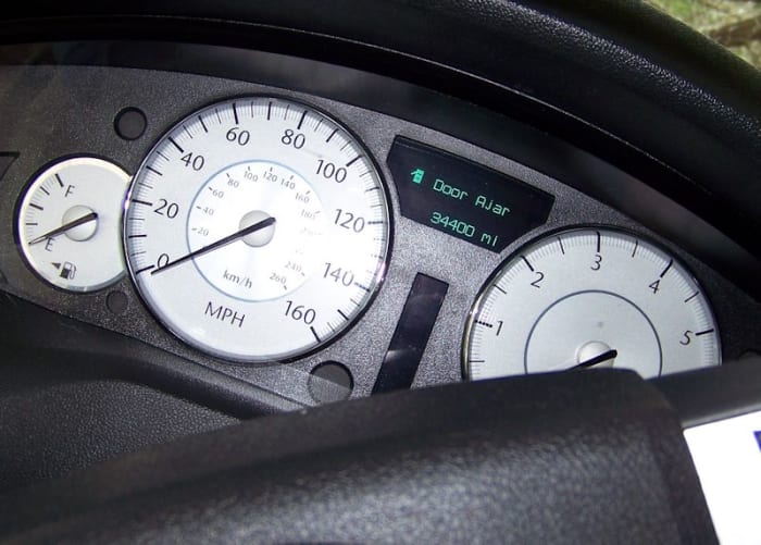 Always check the actual mileage of a used car. The readout may have been altered. Click to enlarge view.