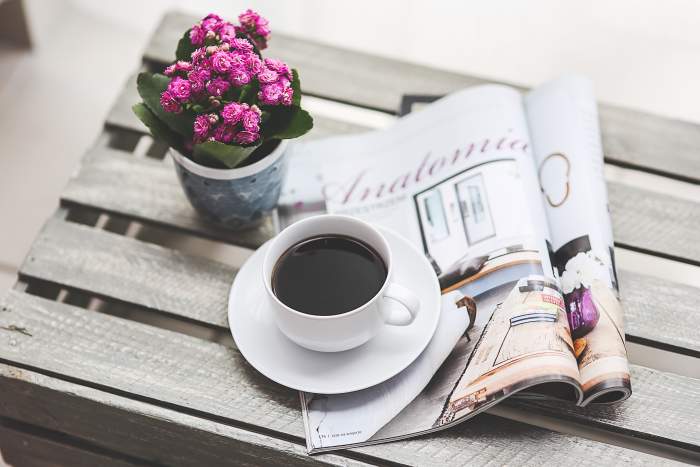A cup of coffee and a magazine to read