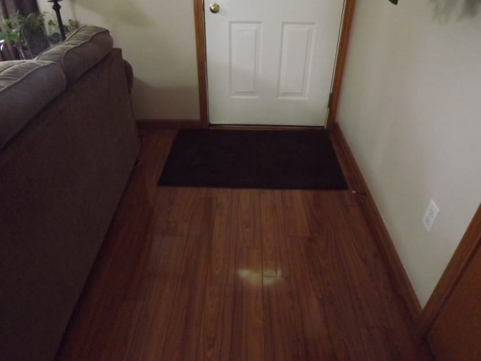 Keep throw rugs in front of entrances to prevent the floor from becoming wet due to shoes and/or pets.