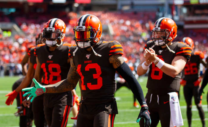 Sep 8, 2019; Cleveland, OH, USA; Cleveland Browns wide recievers Odell Beckham (13) and Damion Ratley (18) along with quarterback Baker Mayfield (6) welcome teammates onto the field before a game against the Tennessee Titans at FirstEnergy Stadium.
