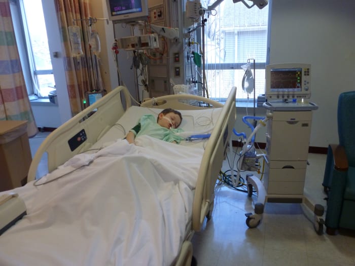 The author's son recovers from his second supraglottoplasty and epiglottopexy surgery.