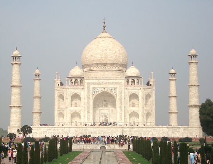 The Taj Mahal, on the bank of the Yamuna River in Agra, was built as a tomb by the Mughal emperor Shah Jahan for his beloved wife.