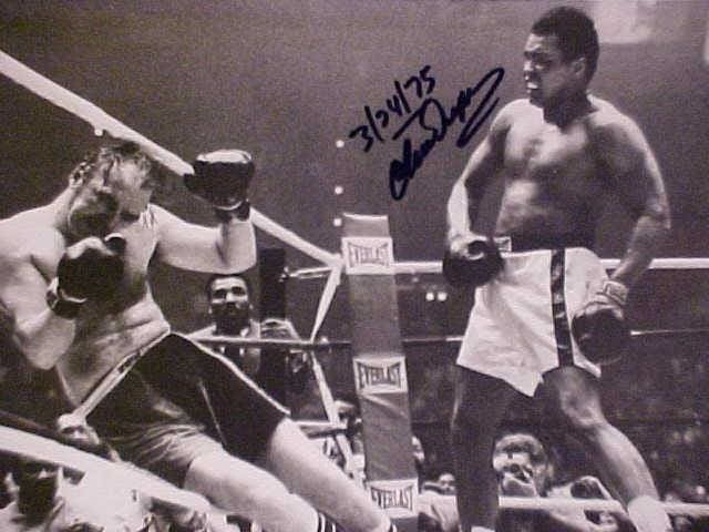 I wrote Chuck Wepner and he kindly sent me this autographed photo of the final moments during his championship bout with Ali.