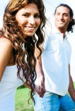 Ease yourself into getting touchy feely by holding her hand at a romantic moment. Give her the time and space to get comfortable with you.