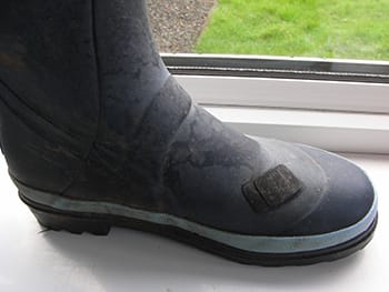 A Wellington boot repaired using a puncture repair kit. As you can see, this one has been repaired twice already.
