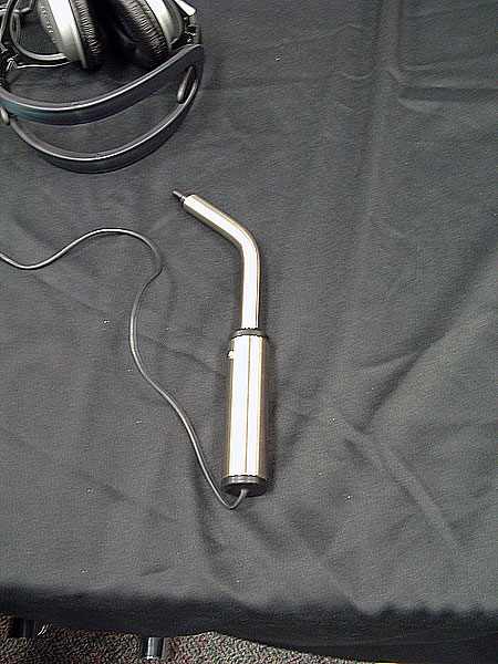 This is a sip-and-puff device, sometimes called a puff mouse, which allows a person with a disability to control computer interface screens by blowing and inhaling into the device.