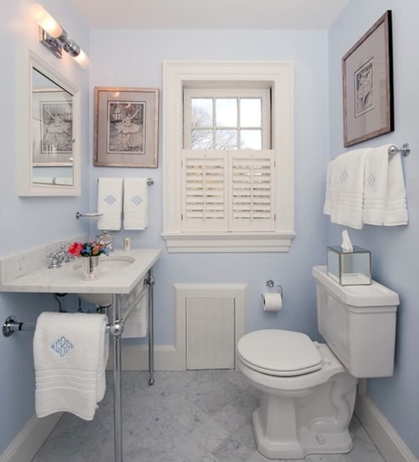 This bathroom is painted in a light blue which allows the light to bounce and reflect off the walls and give you a feel of openness.