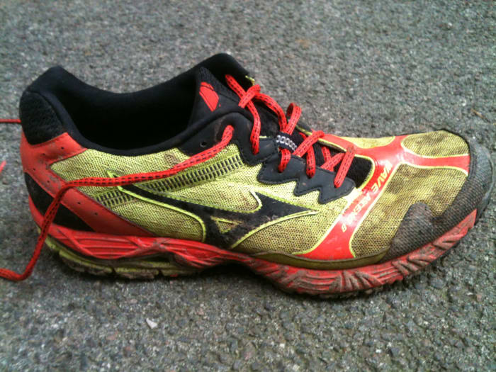 They're a little muddy now but you can still see the bright colourscheme of the Mizuno Wave Ascend 8 trail running shoe