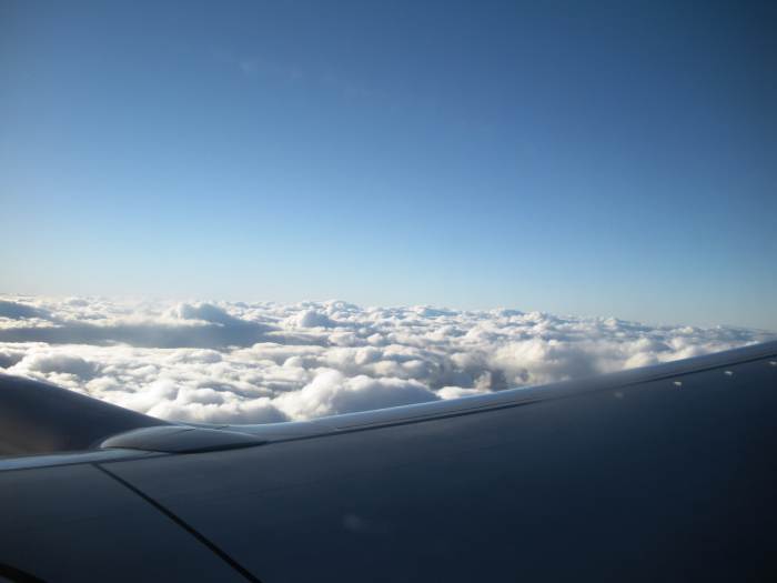 A trip in a plane gives you a chance to see clouds from above. Haven't you always wondered what they look like? If you're really lucky, you'll get to see them at sunset. :)