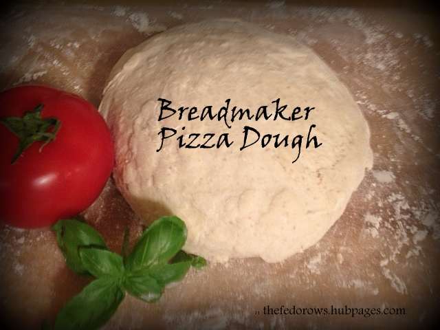 An easy bread-maker pizza dough recipe that can be used for pizza, personal calzones, and stromboli. Soft and chewy on the inside, crispy on the outside! Will make your house smell like a pizzeria!