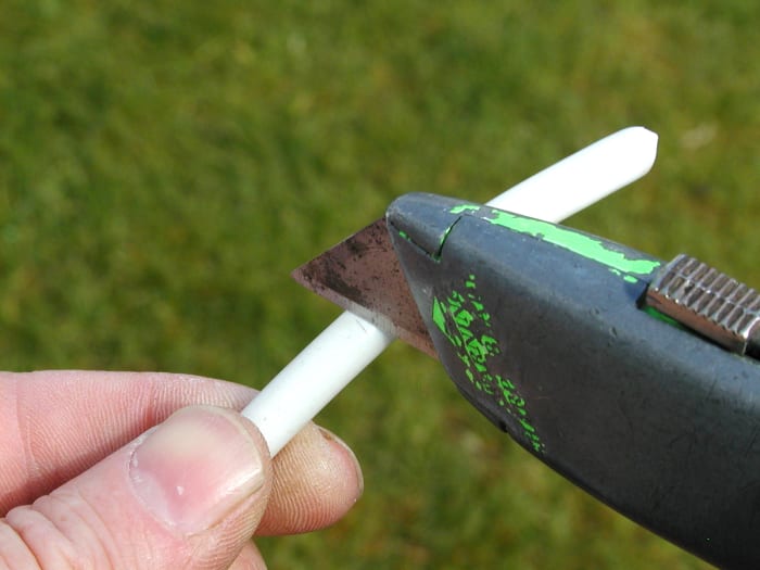 .........alternatively, score the outer sheath with a knife, taking care not to cut all the way through