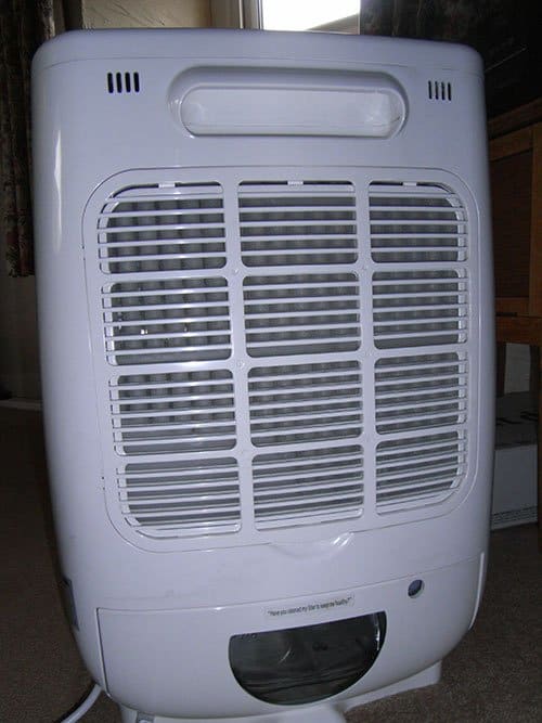 A desiccant dehumidifier not only removes moisture from the air, it also acts as a heater and helps to keep heating costs down.