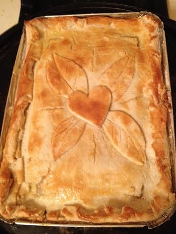Homemade chicken pot pie made with healthy ingredients and enclosed in a homemade pie crust.