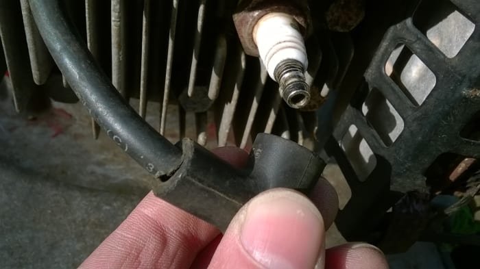 If you're trying to start the motor, check the spark connection. But if you need to clean under the deck or turn the blade, then remove the spark plug first.