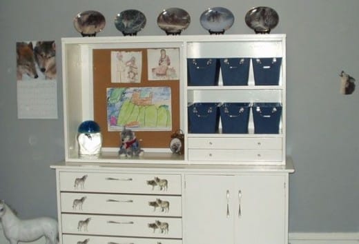 The wolf plate set on the hutch was bought at a local antique store. The wolf decals were ordered online. The blue bins are from a discount store.