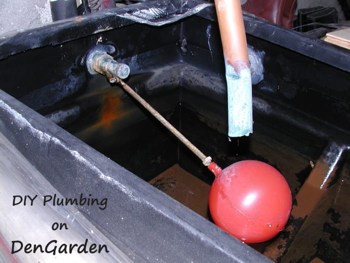 Ballcock in a water tank. The red float attaches via an arm to the valve. Once the water level rises sufficiently, the arm pushes on the valve, closing it