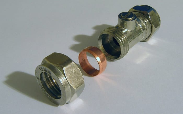 An inline isolating valve which is often used for disconnecting water to individual appliances. A copper compression ring or "olive" seals and makes the fitting water tight. The valve is turned on/off with a screwdriver.