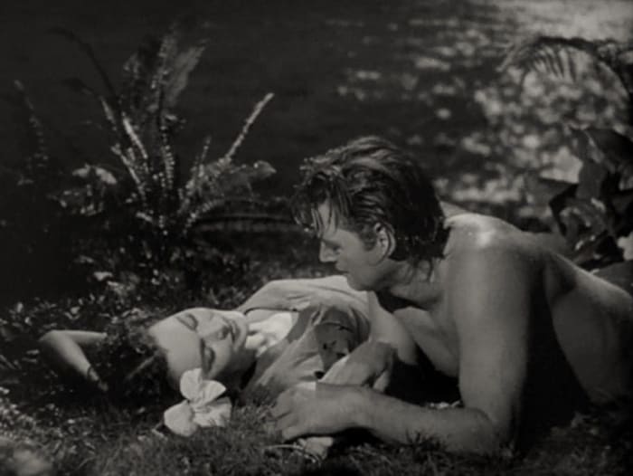 Jane (Maureen O'Sullivan) and Tarzan (Johnny Weissmuller) in a scene from the 1941 film Tarzan's Secret Treasure.