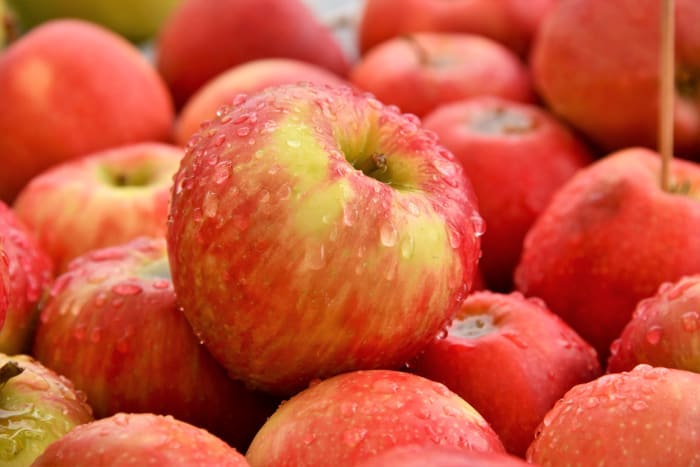 Apples are very healthy, especially if they aren't peeled. The peel contains pectin, which is converted to methanol inside our body.