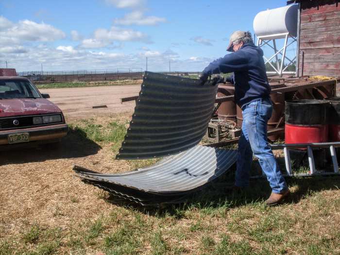 Stack all the sheets from Ring 2, either out of the way or in your trailer. You may wish to adjust the height of the bin before proceeding, depending on whether it is swinging too freely in the breeze.