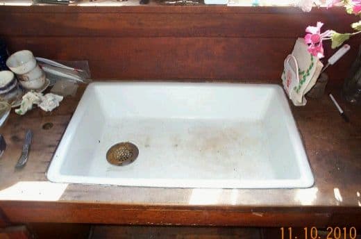 The sink was dirty and lonely when we first came, being without even a pump or faucet. It had not been used in 20 years. The surrounding countertop is fir or spruce, and is a wonderful work surface. It is not spliced, though it is 24" wide.