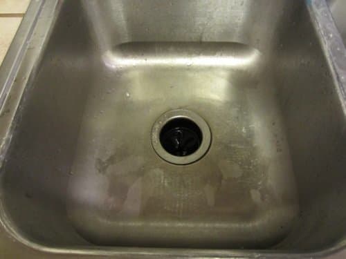What you can't see is the hair, tea leaves, coffee grounds, and celery bits I stuffed down there all day to clog it. This is good! I drained off as much extra water as possible.