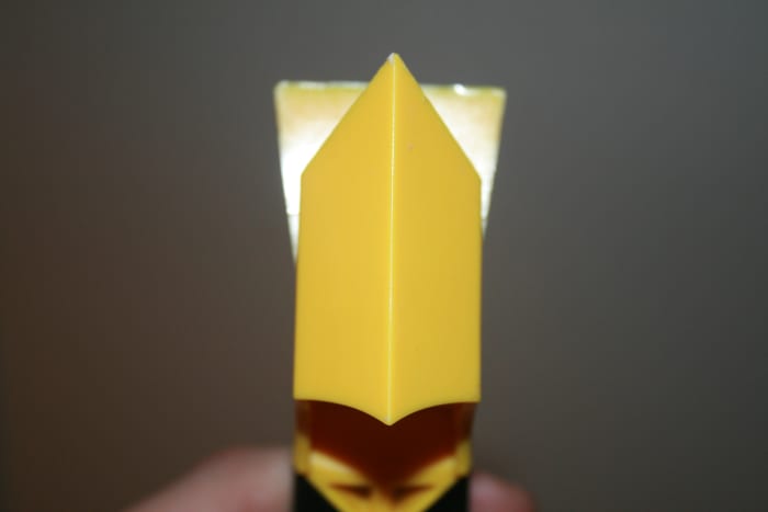 This edged portion lays in the seam of the the two joints. In this instance it is where the tub meets the floor.