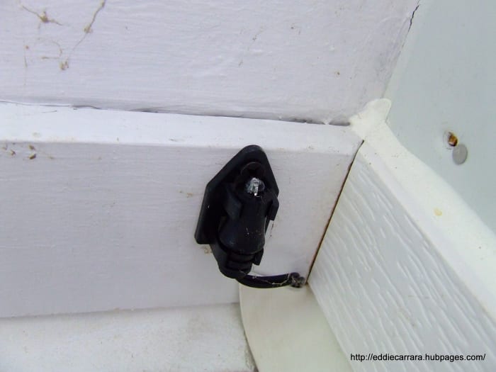 This a photocell light sensor, it's about the size of a quarter. It's best to buy a low voltage lighting transformer with a photocell so you're not constantly adjusting the timer.
