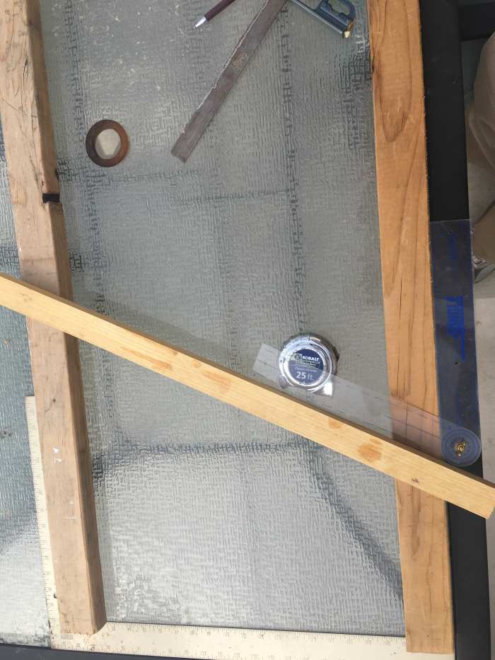 For the purpose of illustration, in this photo the handrail board was moved a lot closer to the carpenter's square representing the floor.