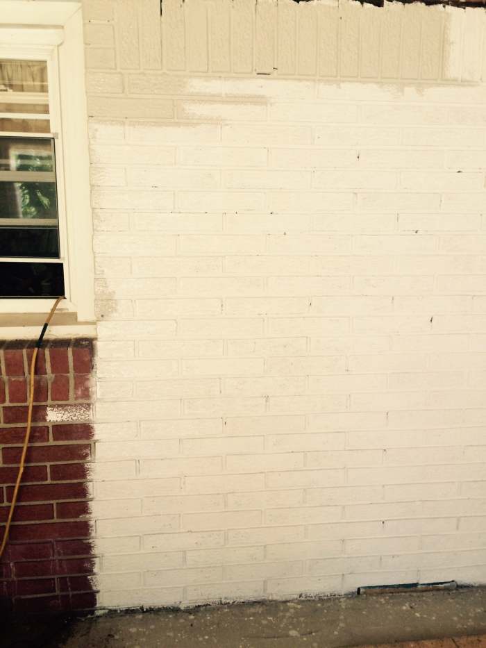 Here's the section of wall that will be left exposed. It's primed and I've started painting on the base color.
