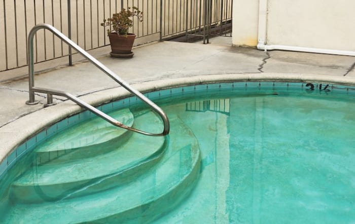 This article will explain why a pool turns green when chlorine is added and what you can do about it.