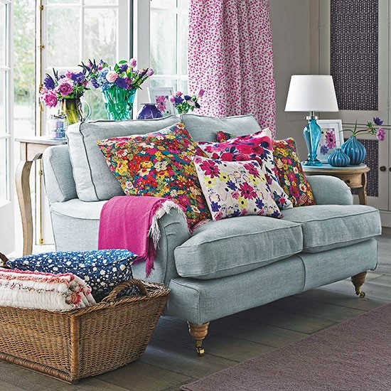The floral theme ties the colored items in the room together.