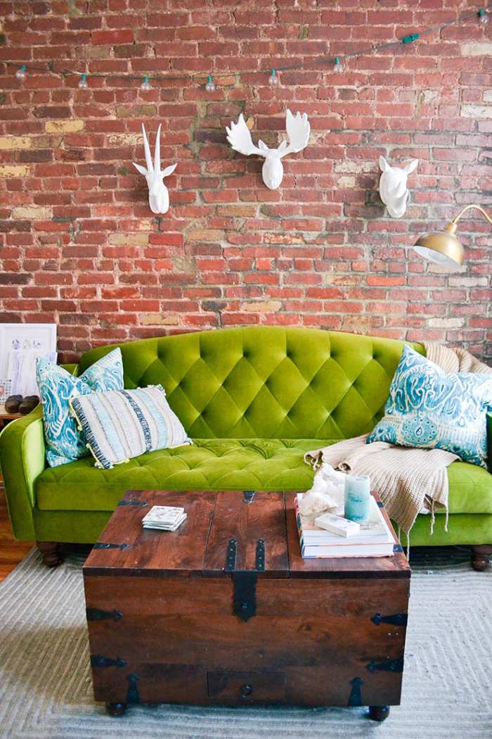 The trunk serves as a coffee table and storage piece while adding a funky vintage touch to the living room.