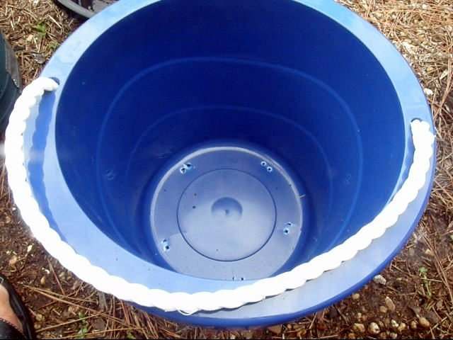 Plastic pots are a good choice as they do not absorb moisture as clay pots do, and drainage holes are easier to make in plastic.
