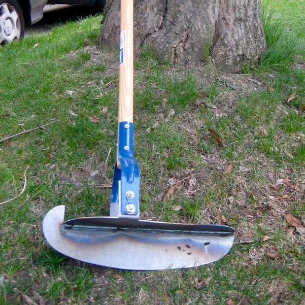 This bladed edger works much better than a weed whacker would. It gives a straighter edge and still leaves the turf next to it as high as it needs to be to prevent weeds. A serrated edge would be even better.