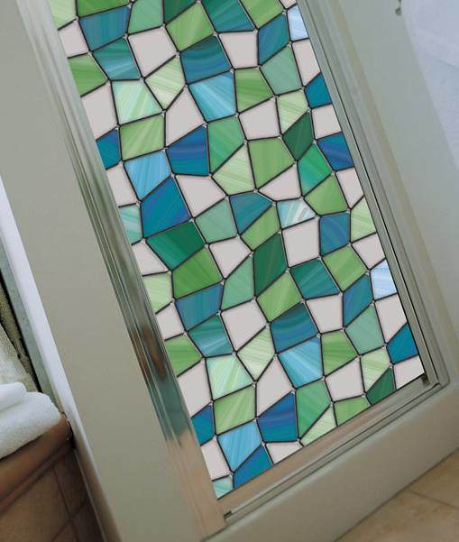 Stained glass paint kits or decorative window film is a great way to spiff up your kitchen cabinets.
