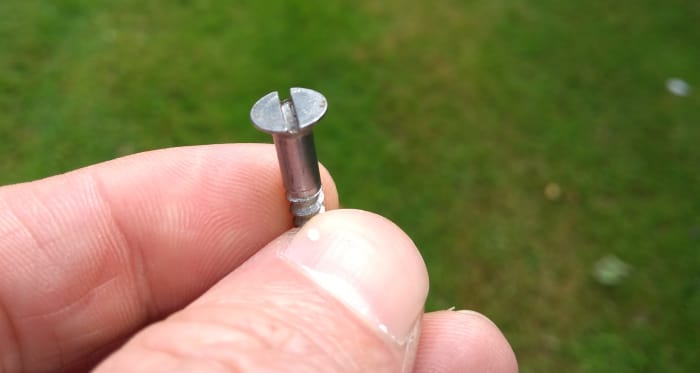 Most woodscrews now have Phillips heads so they can easily be driven with a cordless drill. Older screws were slotted.
