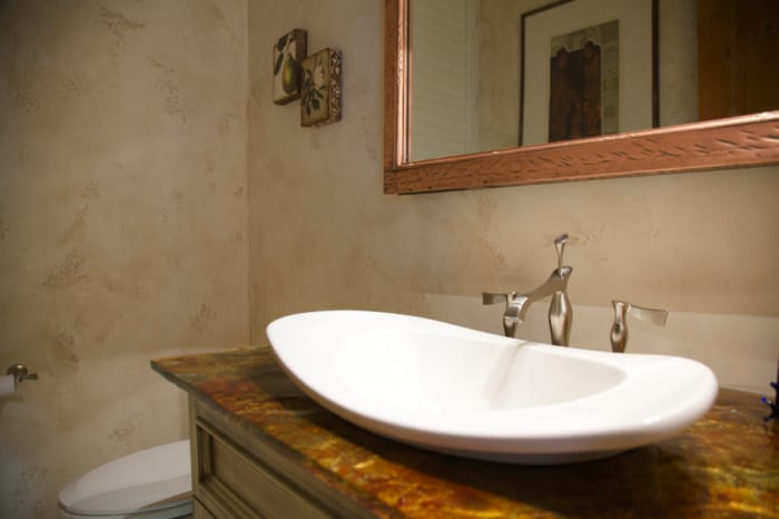 Venetian plaster walls have a subtle sheen and smooth patina that looks like a romantic Italian villa.