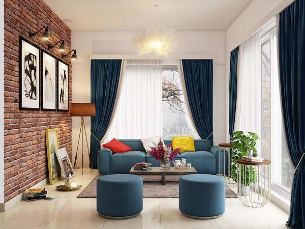 A small uncluttered and impressive sitting area with light tone flooring, white walls and ceiling, and one brick feature wall.