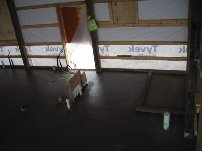 When the concrete floor was poured we had a shower basin poured and formed so we could feel the warmth of the radiant in floor heat underfoot.
