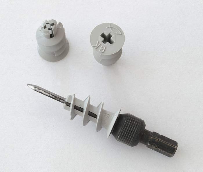 Self-drive drywall anchors and drive bit for cordless drill. Metal versions are also available. The pilot hole size which needs to be drilled in the plasterboard (6mm), is marked on the fixing