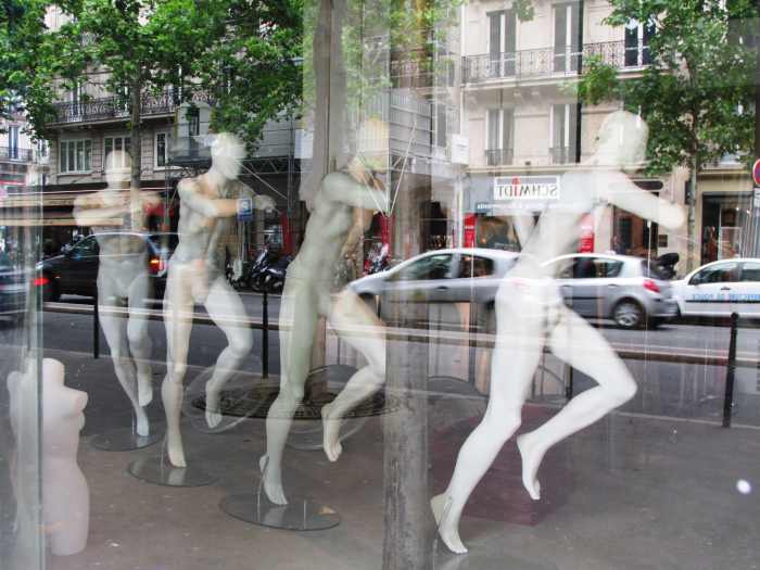 Did I catch them in the middle of naked mannequin aerobics? Is there a message to these mannequin displays? Or, does the window designer just have an offbeat sense of humor?