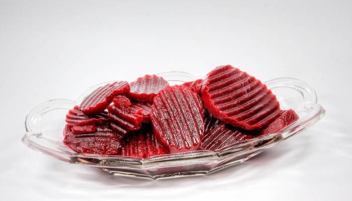 Beets or beetroot can turn urine pink or red. These are pickled beets.