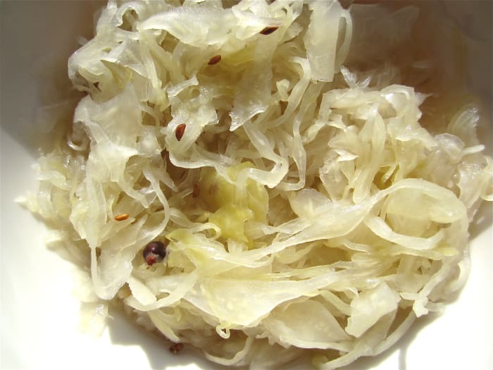 Natural, refrigerated sauerkraut contains probiotics. These potentially helpful bacteria and yeasts may become part of the intestinal flora.