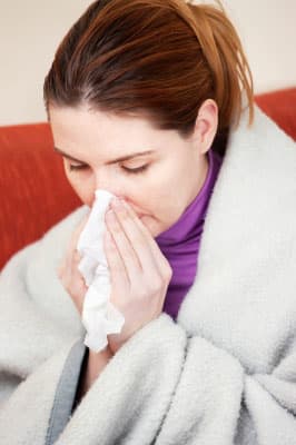 Coughing, sneezing and talking spread contaminated influenza droplets.